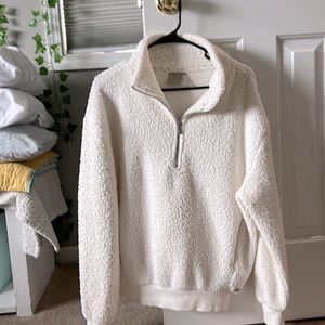 White fluffy half zip